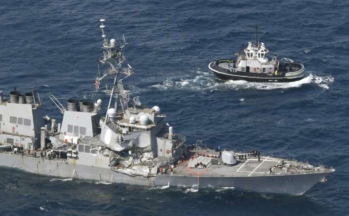 US Navy ship damaged in collision with container ship off