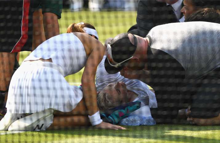 Bethanie Mattek-Sands of USA receives treatment from the