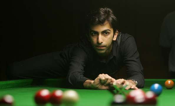 Cueist Pankaj Advani takes aim during his final match