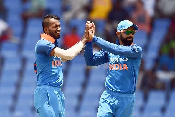 Hardik Pandya celebrates with team captain Virat Kohli