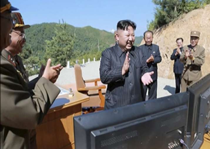 File pic -Kim Jung Un applauding after intercontinental