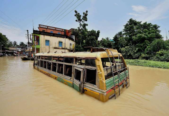 A bus submerged in flood waters at Ghatal in West Midnapore