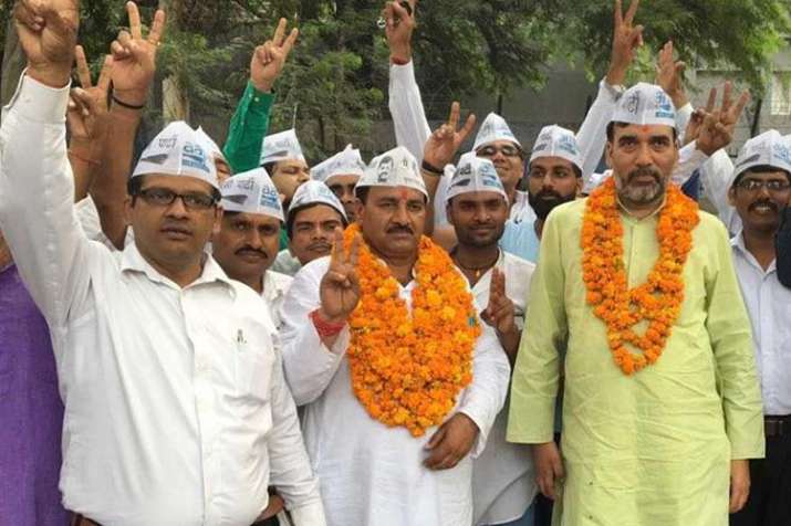File Photo - AAP candidate Ram Chander in the middle
