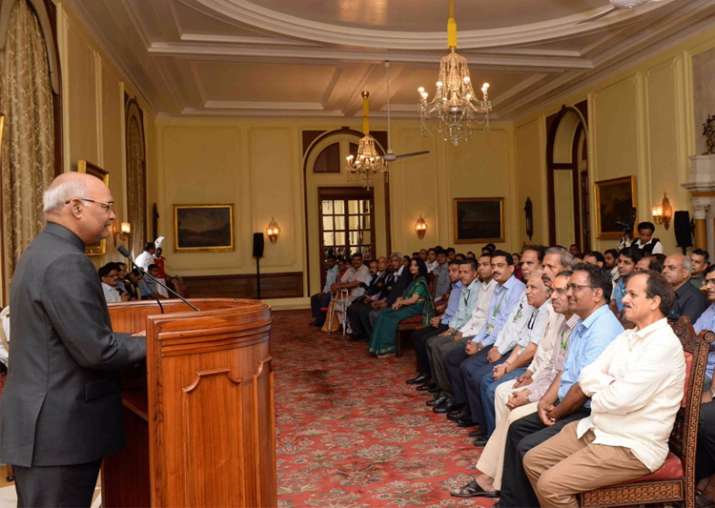 President Kovind meets the officers and staff of