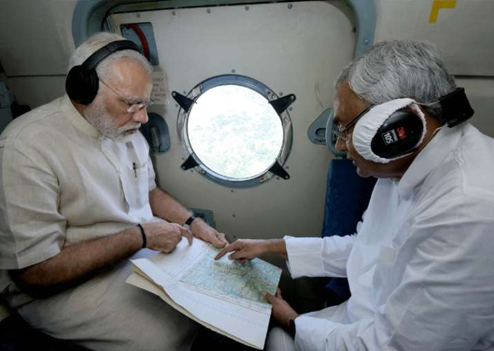 PM Modi conducts aerial survey of flood-hit districts in