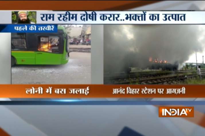 Bus torched in Delhi; police looking into fire on two train