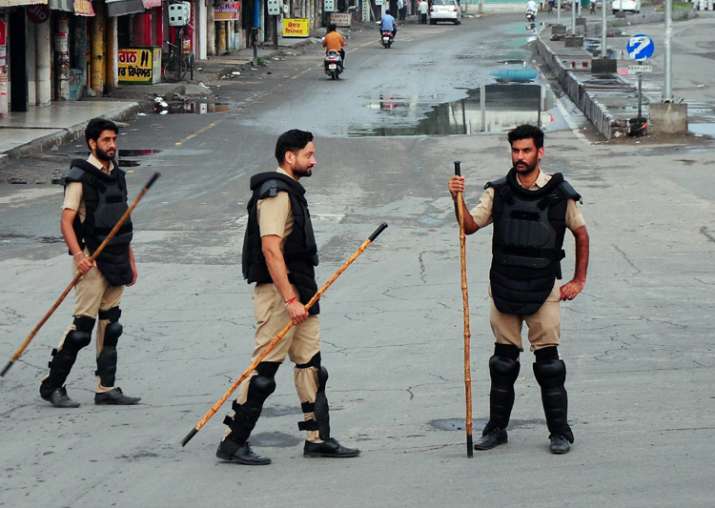 File pic: Security personnel keep vigil in a street in