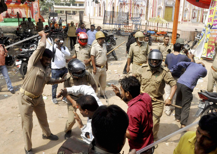 Police lathi-charge during a clash between two communities