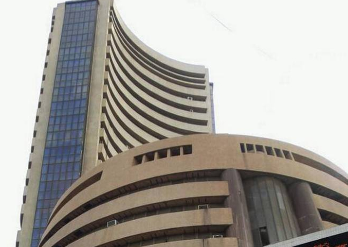 Market scales new peak; Sensex gains 104 points to end at