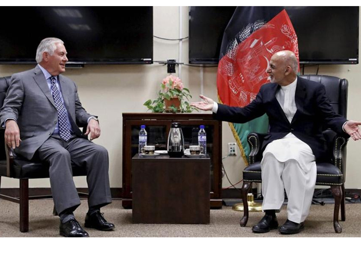 Rex Tillerson speaks with Ashraf Ghani at the Bagram Air