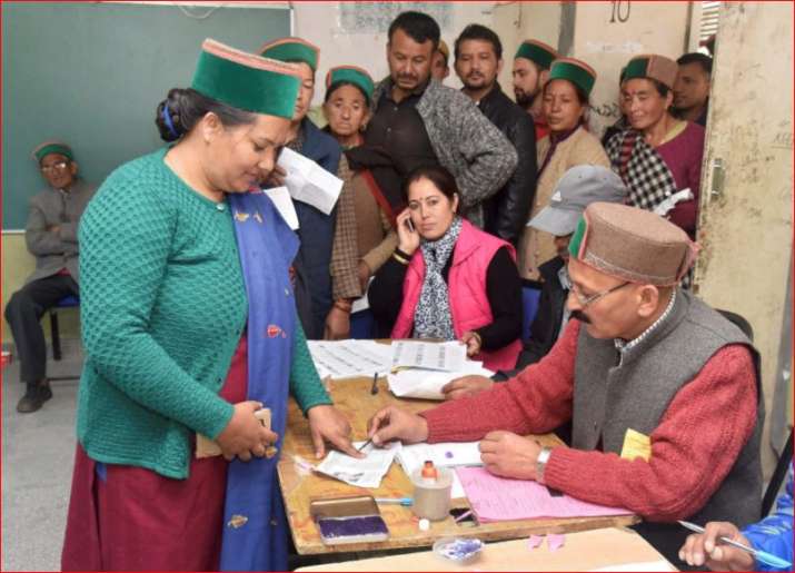 A woman casting her vote in Kinnaur