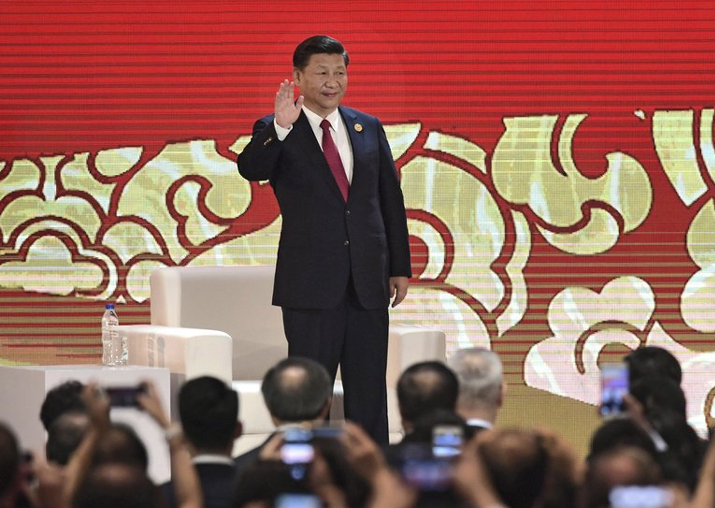 Xi Jinping arrives to speak on the final day of the APEC