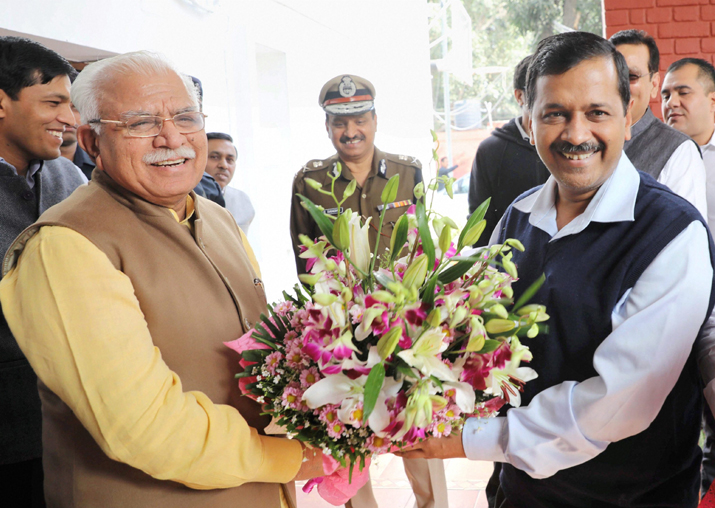Manohar Lal greets Arvind Kejriwal before a meeting in