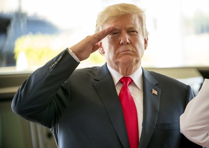 Facing tumult at home, Donald Trump sets out on lengthy