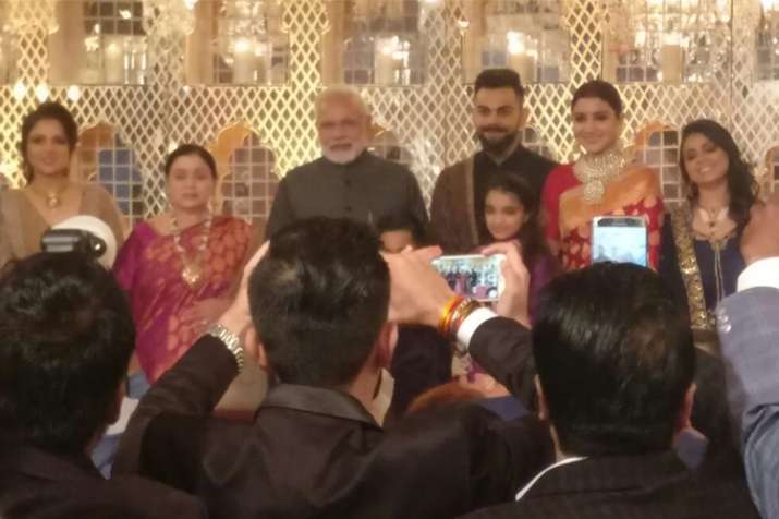 PM Modi attends Virat-Anushka wedding reception, showers