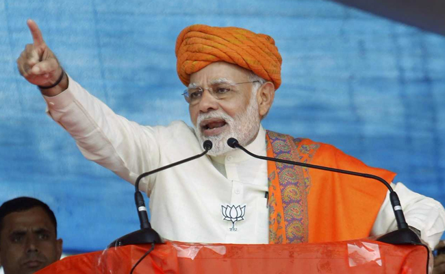 Why does Pak Army ex-DG want Ahmed Patel as Gujarat CM: PM