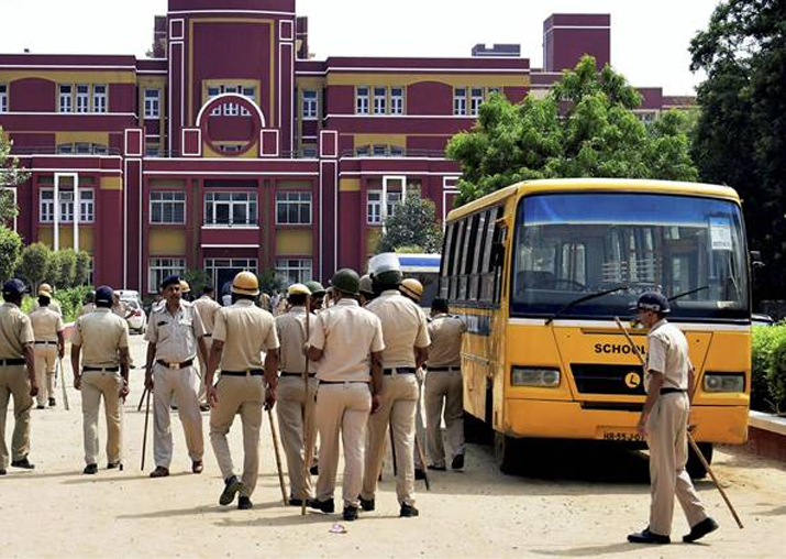 File pic - Police officials outside Ryan International