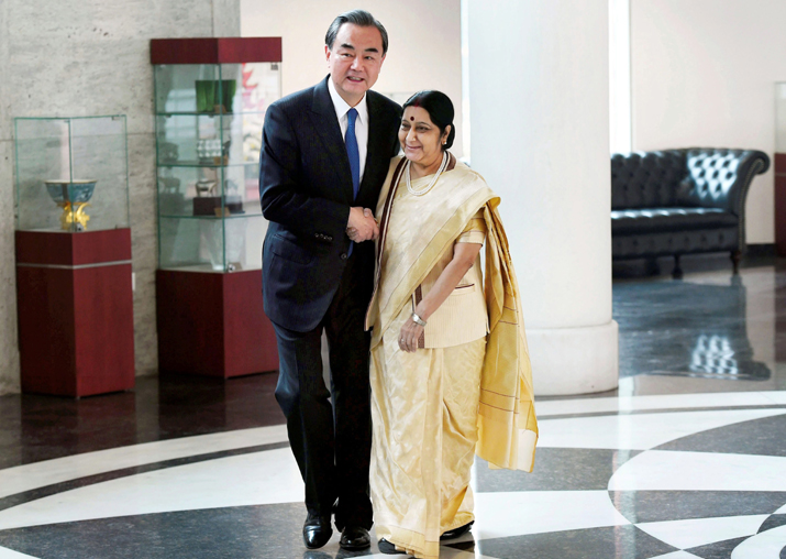 Sushma Swaraj and her Chinese counterpart Wang Yi exchange