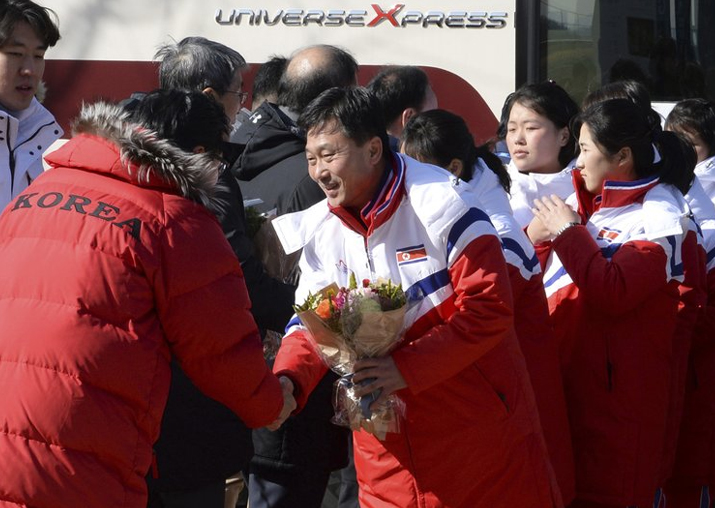North Korean women’s ice hockey players are greeted as