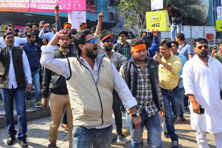 Rajput community people protest outside a cinema hall