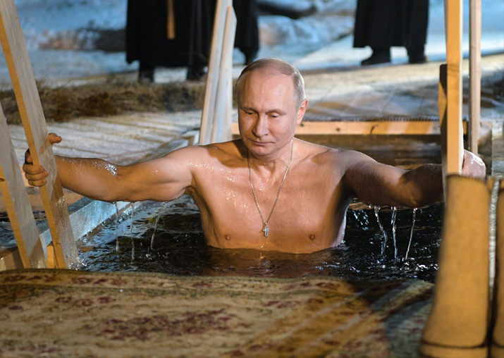 Vladimir Putin dips into icy waters to mark Orthodox