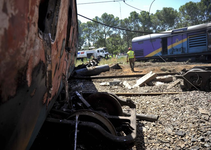 Ruined carriages at the scene of a train accident near