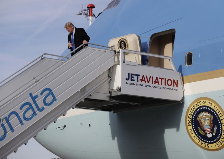 Donald Trump steps off Air Force One on arrival at Zurich
