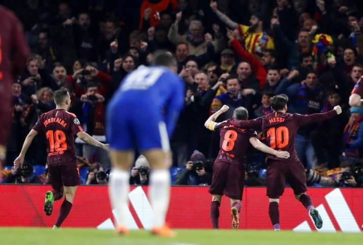India Tv - Chelsea players look on as FC Barcelona celebrate after scoring.