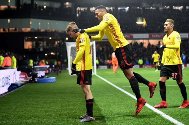 India Tv - Watford players celebrate after a dismissal