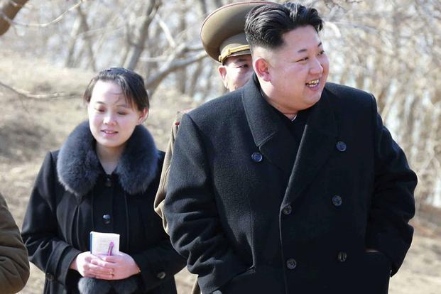 A file photo of North Korean leader Kim Jong Un (right) and