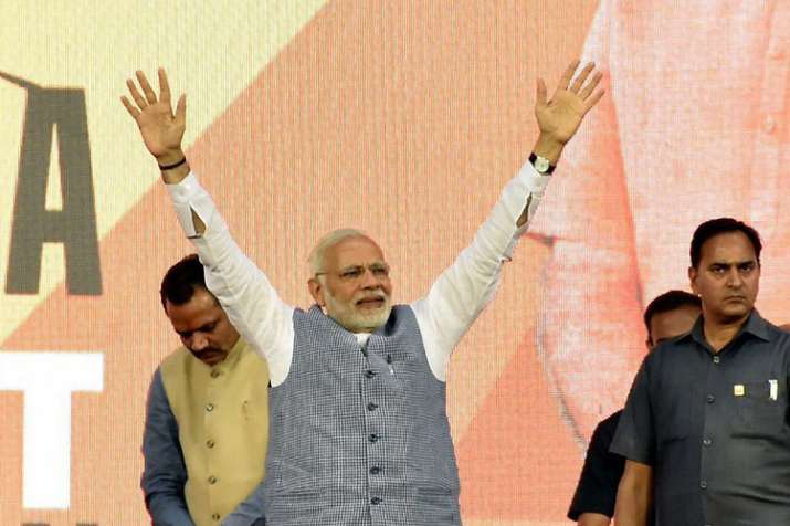 Prime Minister Narendra Modi waves to the crowd during