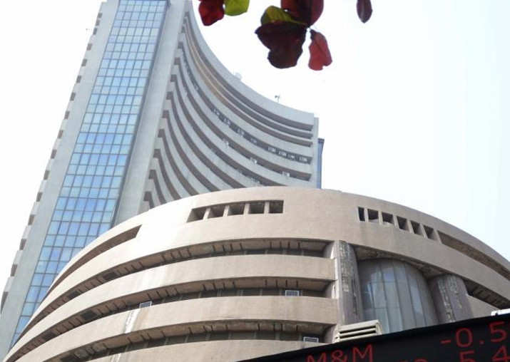 Markets retreat on global rout, Sensex falls 407 points to