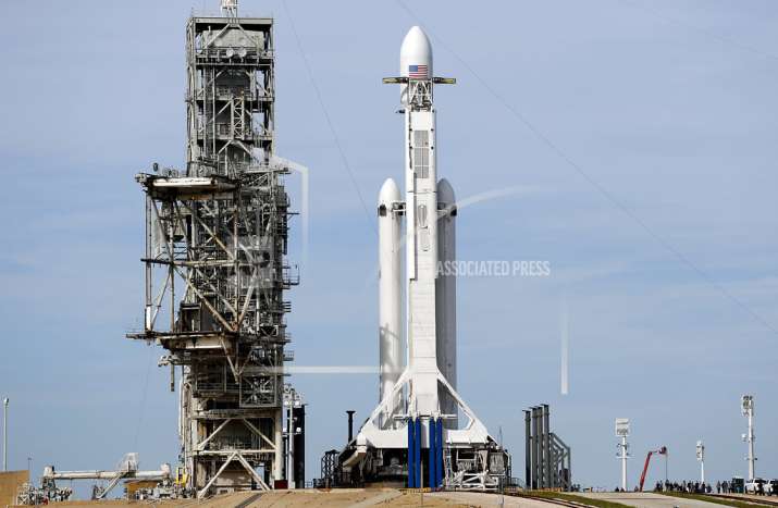 A Falcon 9 SpaceX heavy rocket stands ready for launch on