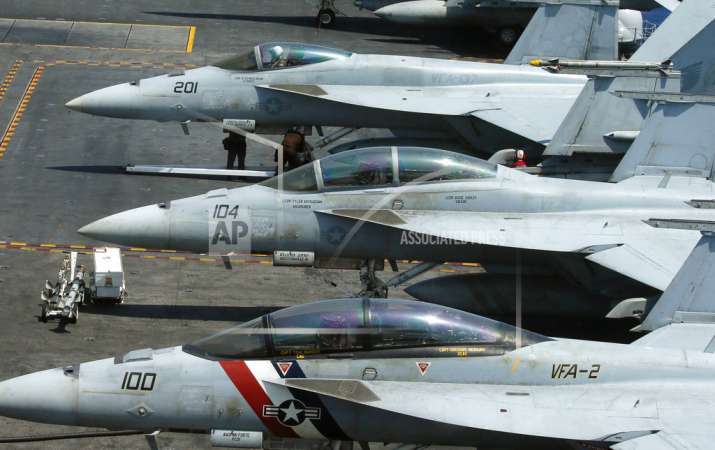Navy officials say a fighter jet has crashed off the coast