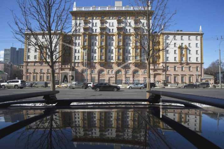 The US Embassy is reflected in a car in Moscow, Russia on