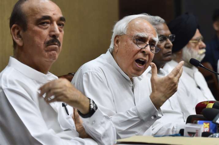 Congress leader Kapil Sibal addressing a press conference