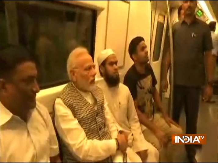 PM Modi takes ride in Delhi Metro; to dedicate Dr Ambedkar