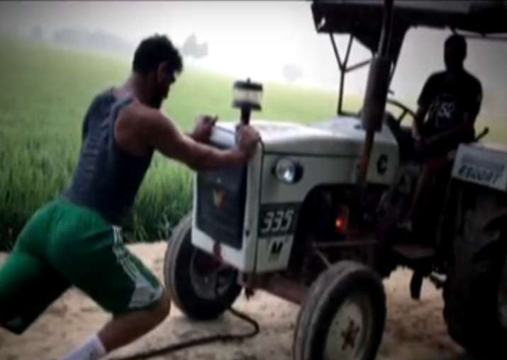 India Tv - Satnam Singh trains with tractor in farm