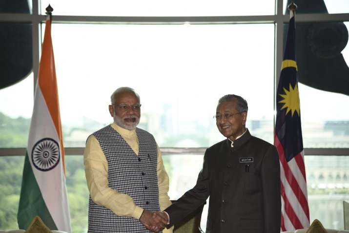 Modi and Mahathir meet to deepen bilateral relationship in