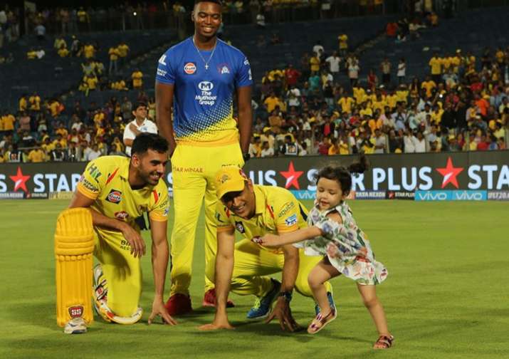 India Tv - Lungi Ngidi, Deepak Chahar, Dhoni and his daughter after the CSK KXIP clash