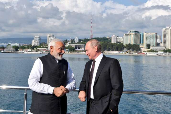 India Tv - PM Narendra Modi and Russian President Putin had plenty to discuss as they sail together from Bocharev Creek to Olympic Park in Sochi. (Photo/Twitter/@MEAIndia)