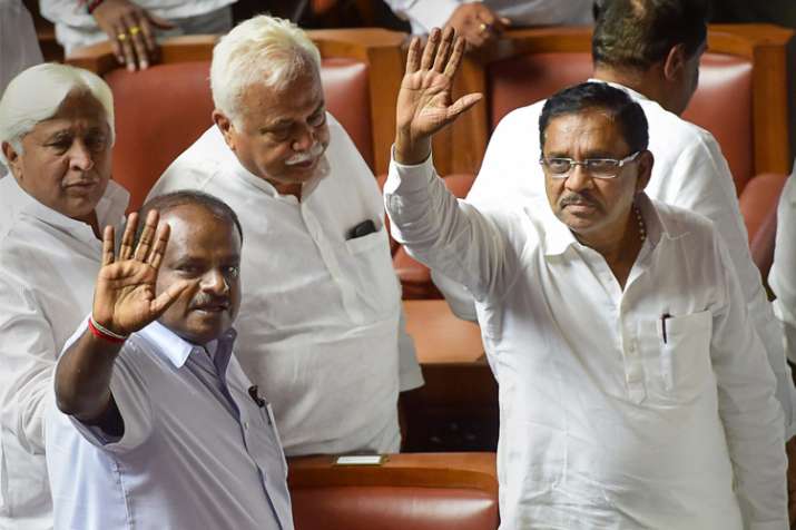 H D Kumaraswamy with his deputy G Parameshwara and other