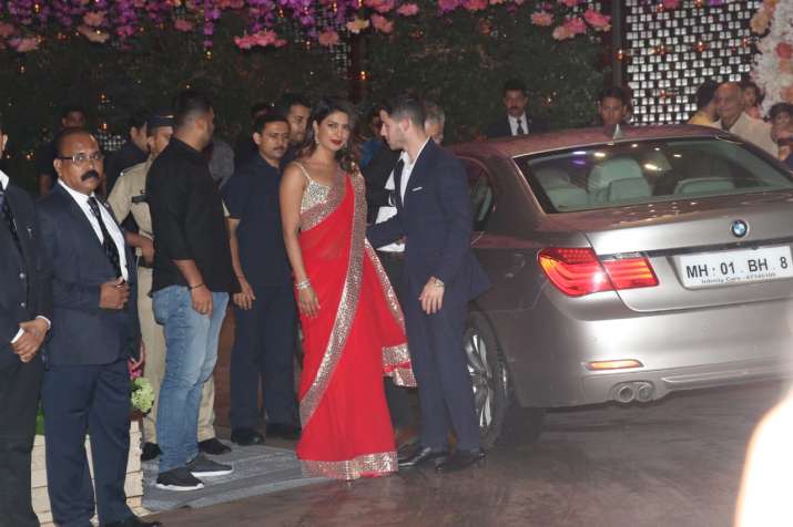   India TV - Priyanka Chopra and Nick Jonas arrived in holding hands to Akash Ambani -Shloka Mehta engagement 