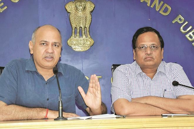 Delhi's Deputy Chief Minister Manish Sisodia along with