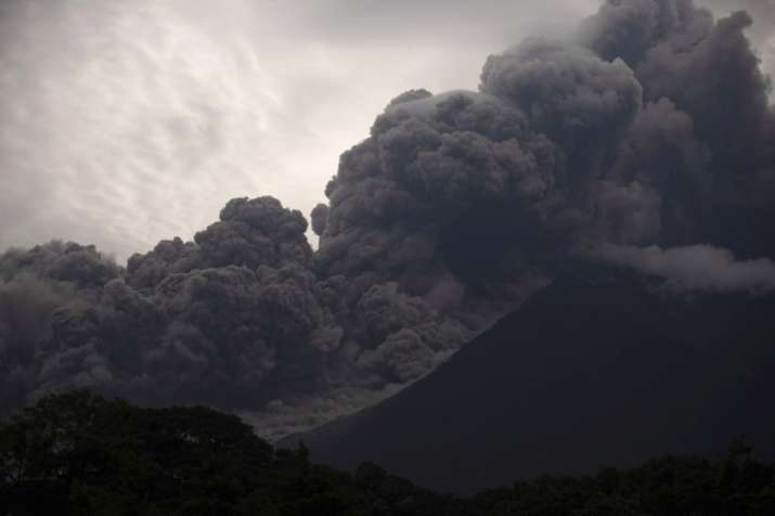 Volcan de Fuego, or Volcano of Fire, blows outs a thick
