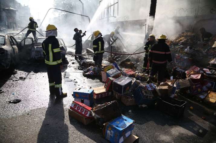 At least 19 people were killed, many of them Sikhs, in a