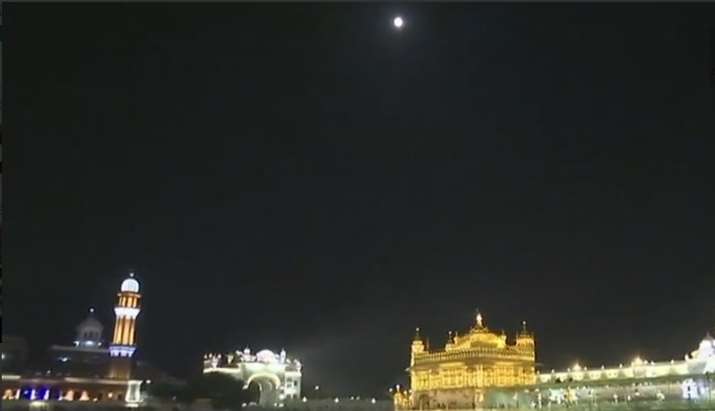  India TV - Visual of the moon before the lunar eclipse from the Golden Temple of Amritsar 