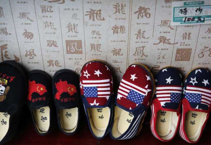 Chinese made children shoes carrying a Chinese map and U.S.
