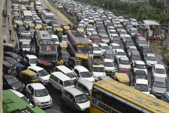 Heavy rains batter Delhi-NCR: 2 killed as waterlogging, traffic jams ...