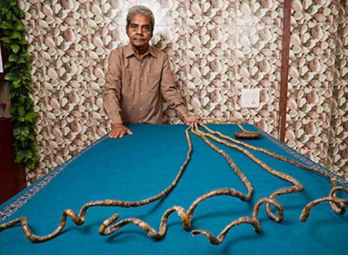 indian-man-with-guinness-world-record-longest-nails-cuts-them-after-66